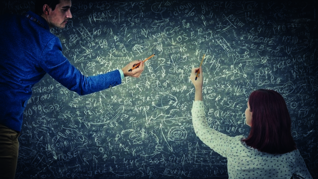 Photo of man and woman sharing thoughts together solve difficult tasks on blackboard