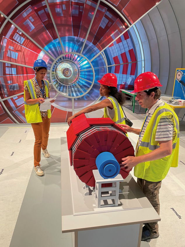 Blind visitors test a tactile exhibit