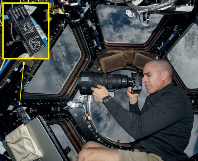 Chris Cassidy working near the Timepix USB